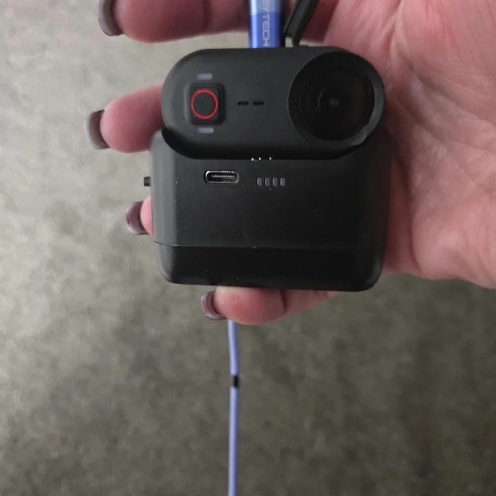 Black Action Camera with Accessories